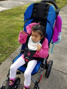 Getting ready to school, in adptive stroller