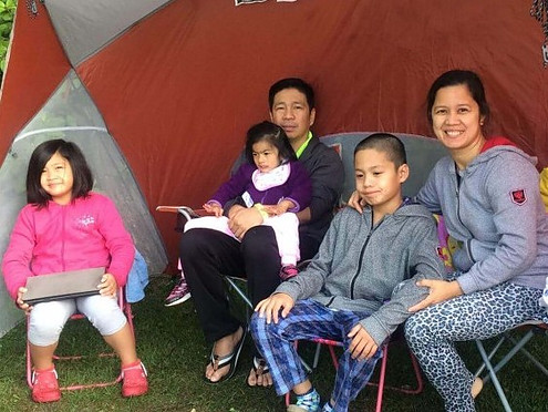 Girl with Cornelia de Lange syndrome with family