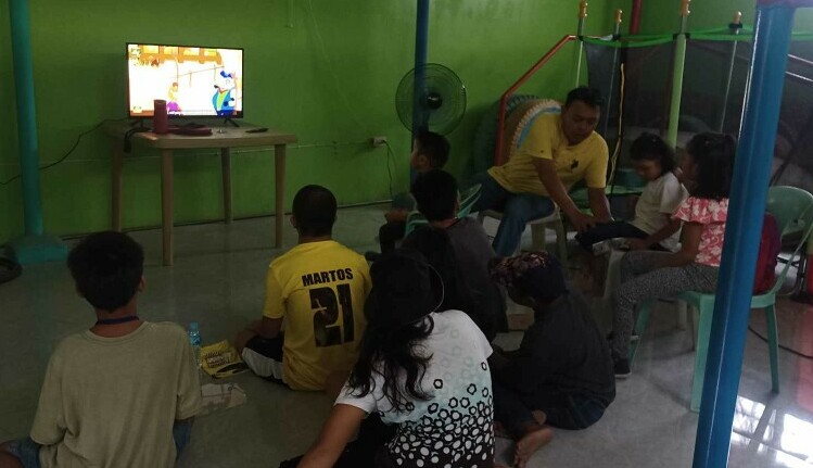 Watching TV shows in the indoor play area